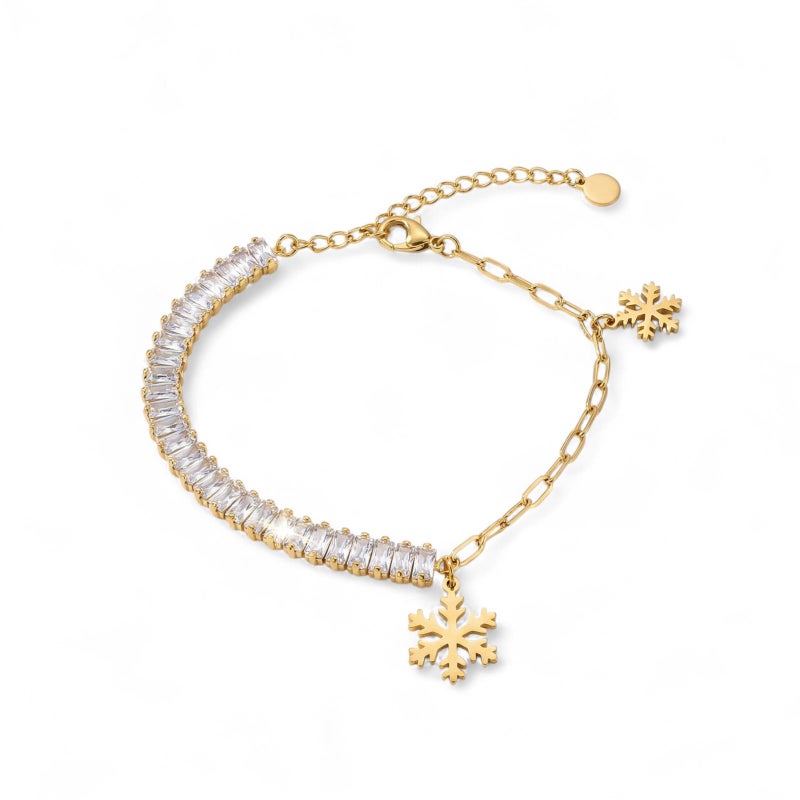 An elegant gold bracelet made of rust-resistant stainless steel, combining the sparkle of shiny zircon stones and delicate snowflake pendants, with an adjustable clasp to fit you. - Image 1